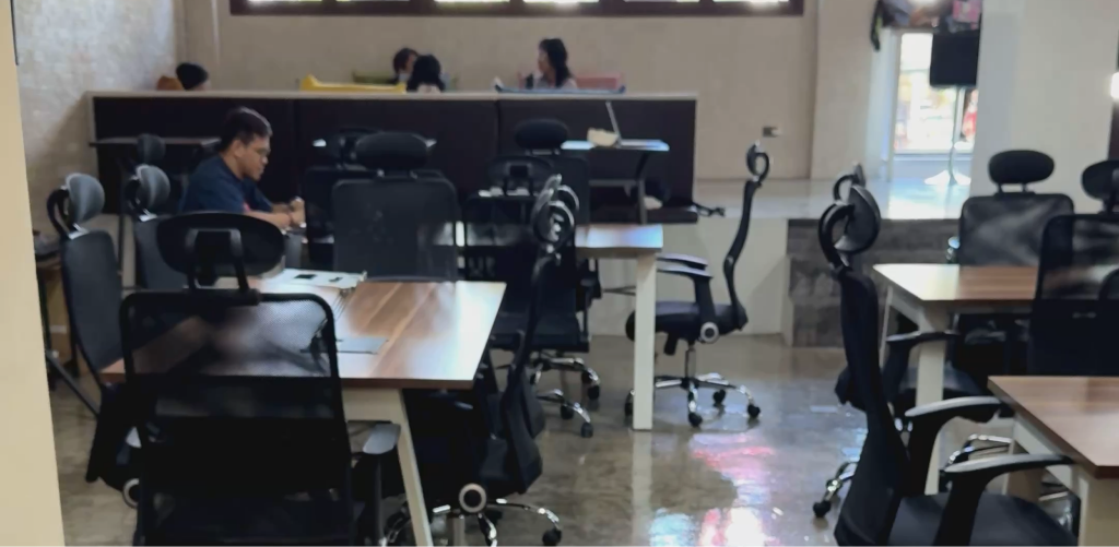 Coworking space interior with desks and seating